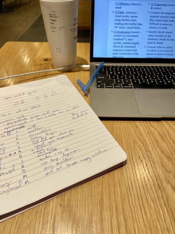 schoolwork at starbucks table.