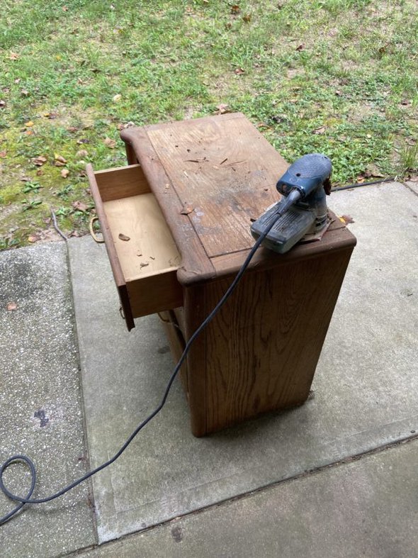 sander on nightstand.