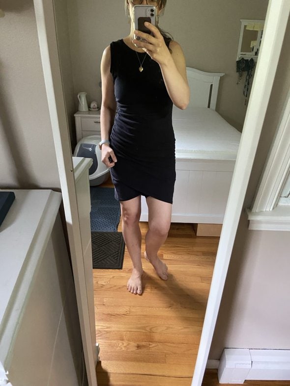 Kristen in a black dress.