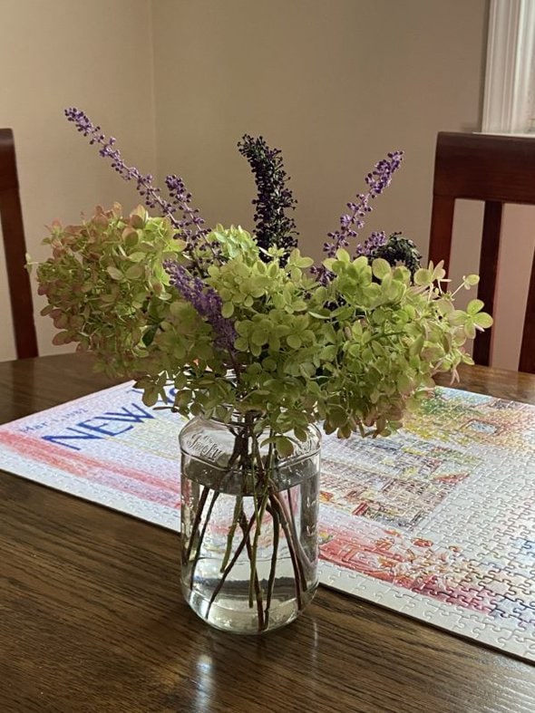 flowers in a glass jar.