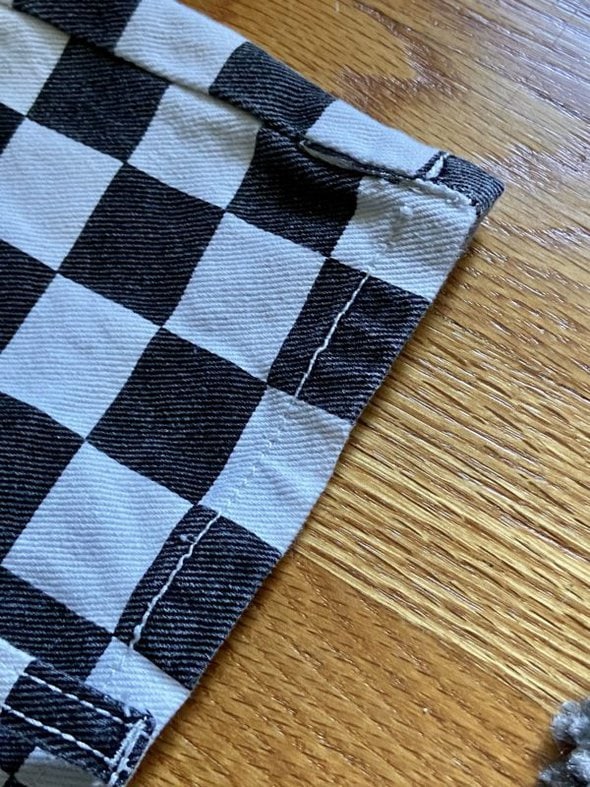 closeup of checkered skirt.