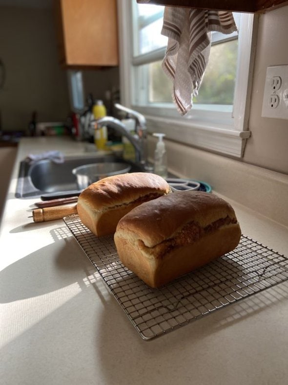 cinnamon bread cooling on a rack.
