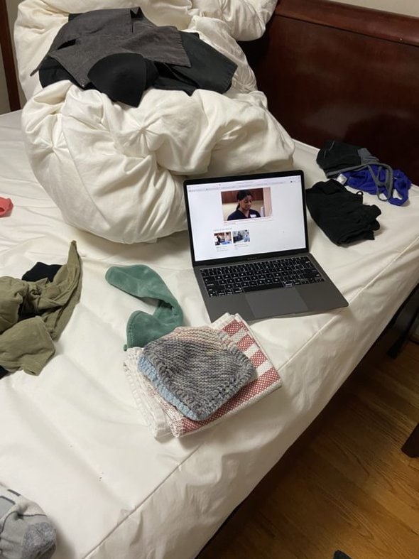laptop near laundry.