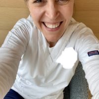 Kristen in student scrubs.