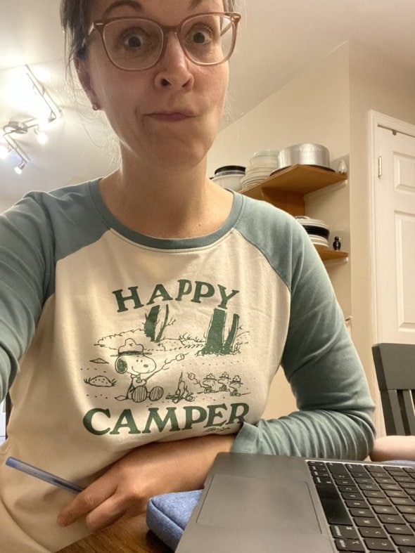 Kristen in a happy camper shirt.
