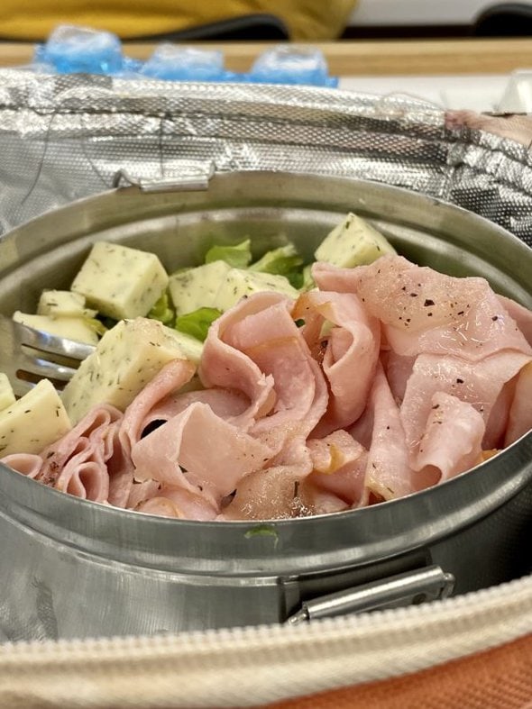 salad in a metal container.