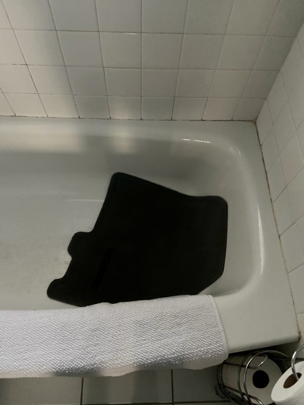 floor mat in bathtub.