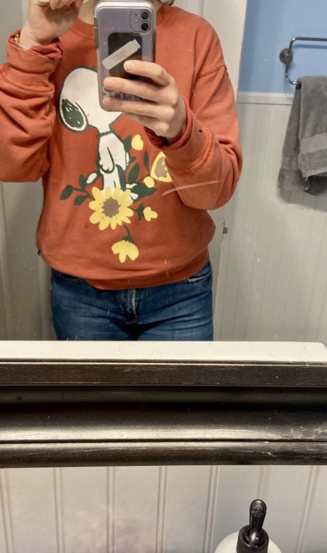 Kristen in a snoopy sweatshirt.