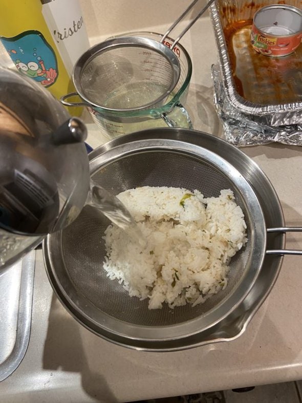 boiling water over rice.