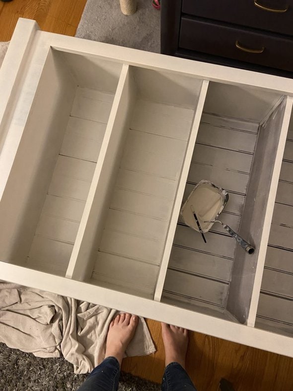 partially-painted bookshelf.