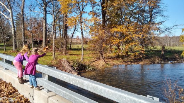 kids on a bridge.