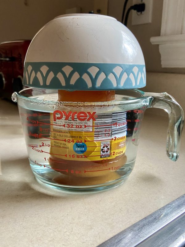 jar of honey in hot water.