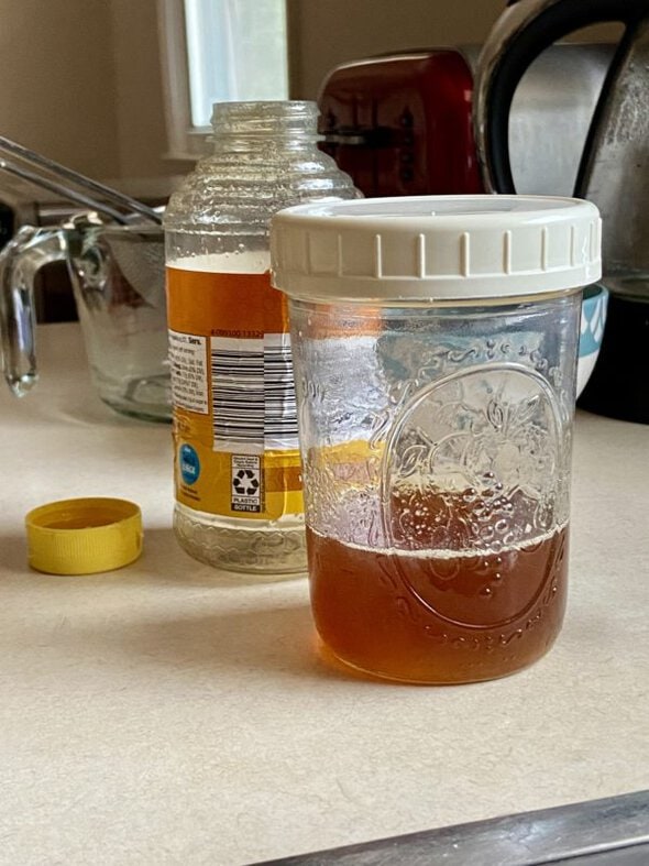 glass jar of honey.
