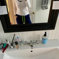 Kristen in scrub pants.