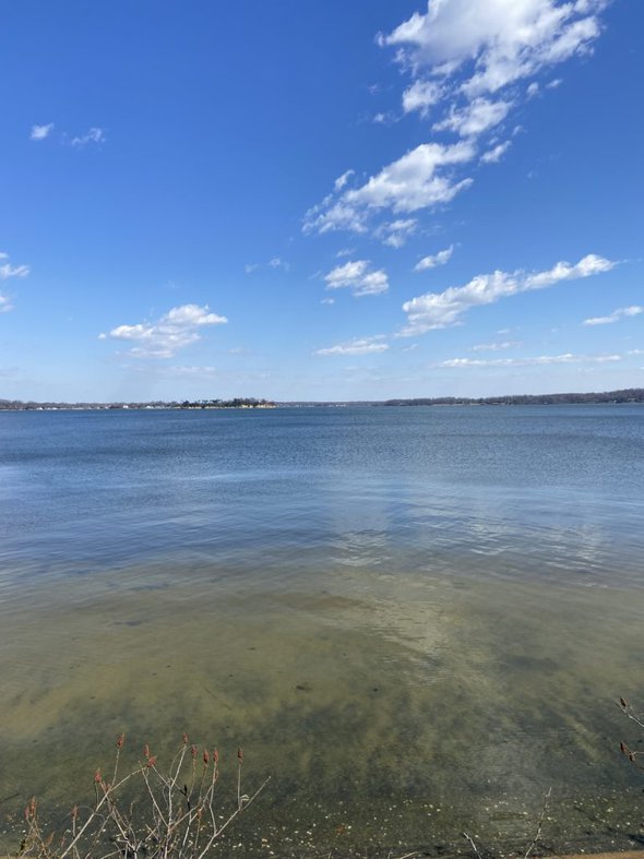 river under a blue sky.