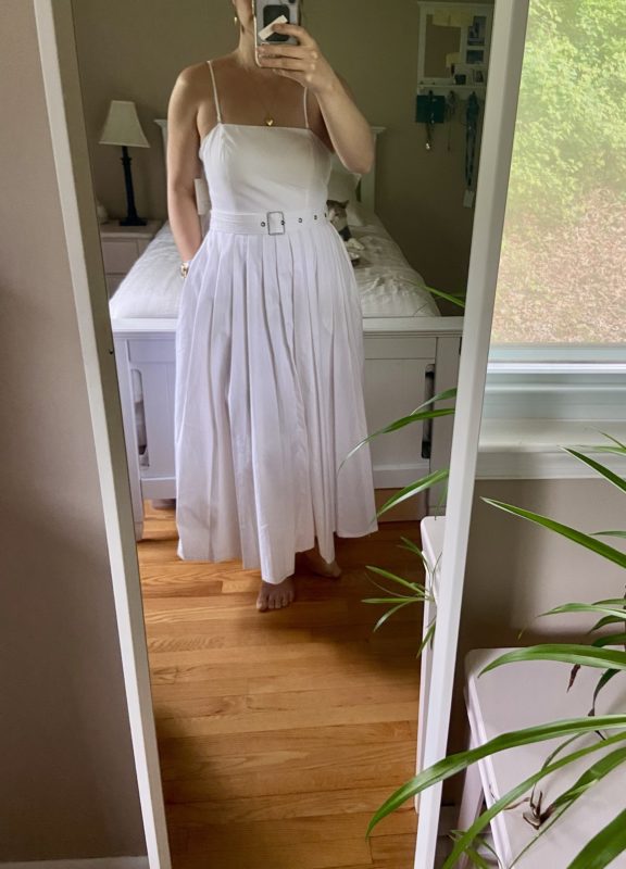 Kristen in a white dress.