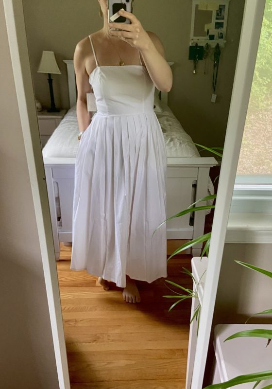 Kristen in a white dress.