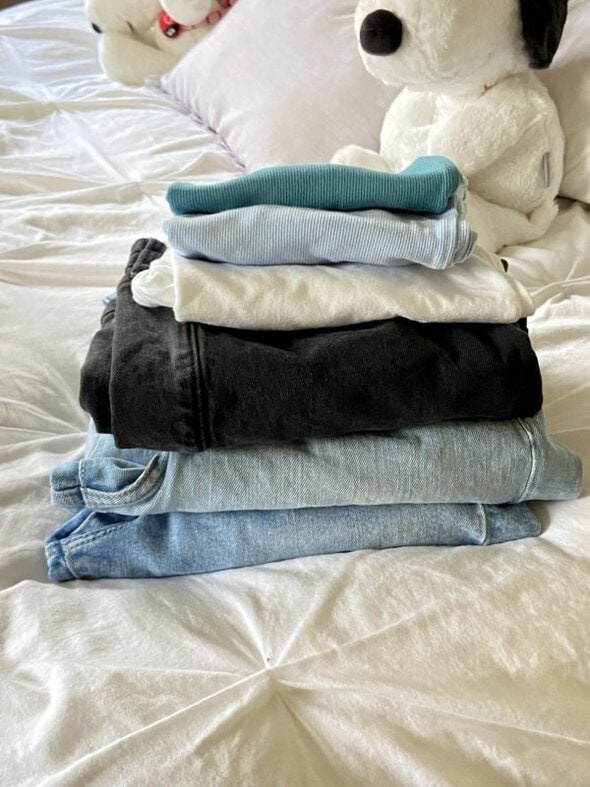 folded pile of clothes.