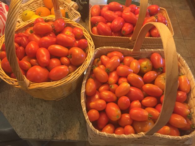 tomatoes in baskets.
