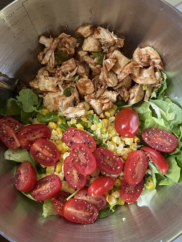 chicken salad in a metal bowl.