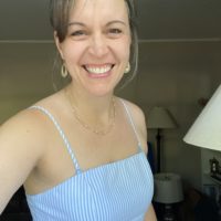 Kristen in a blue dress.