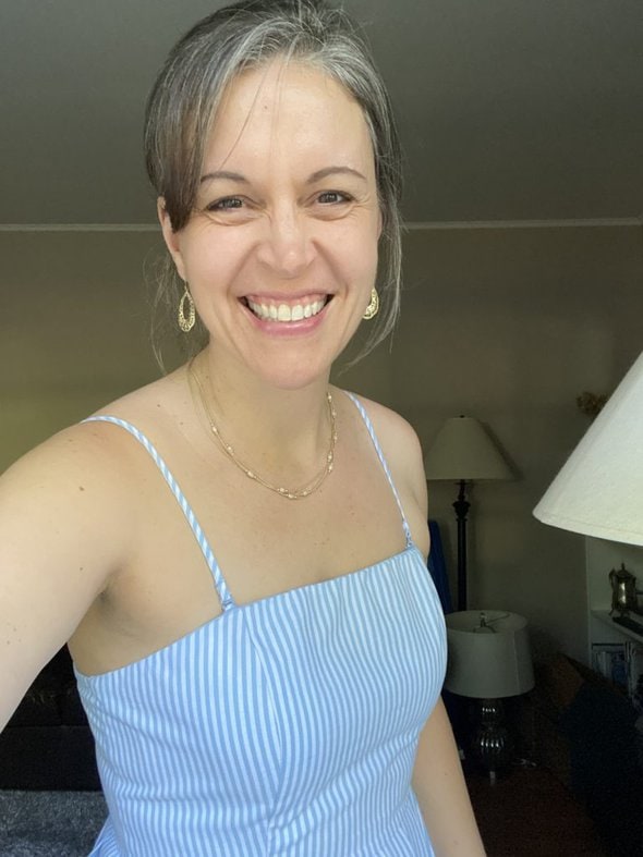 Kristen in a blue dress.