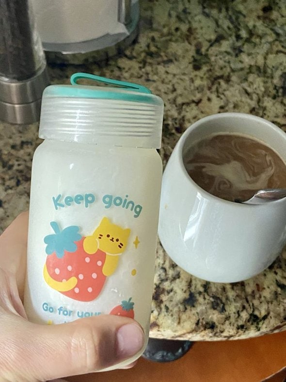 glass jar and a cup of coffee.