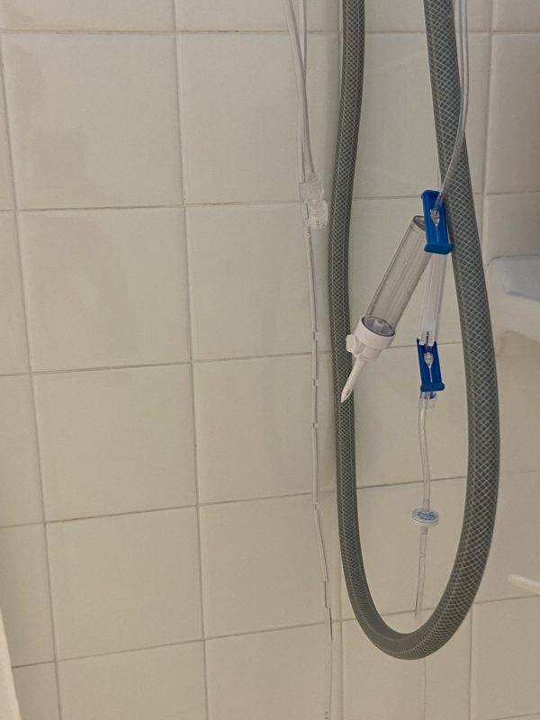 ivs hanging in shower.