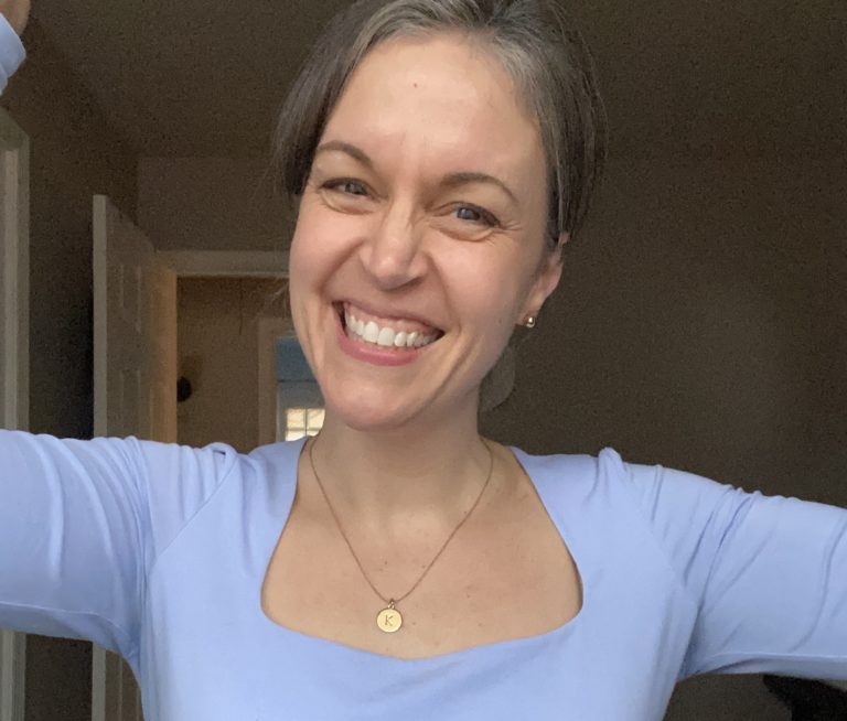 Kristen in a blue shirt.