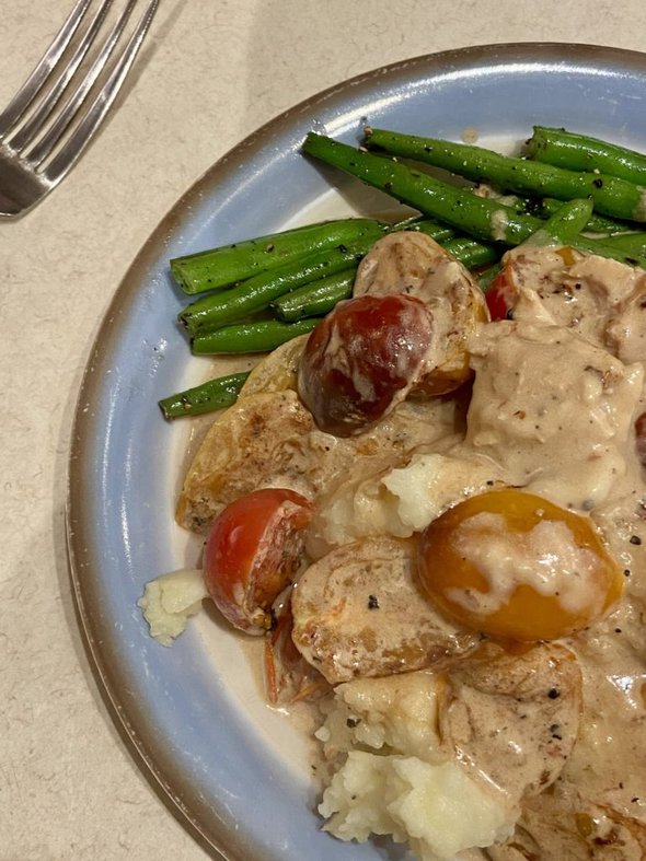 mashed potatoes, chicken, and beans.