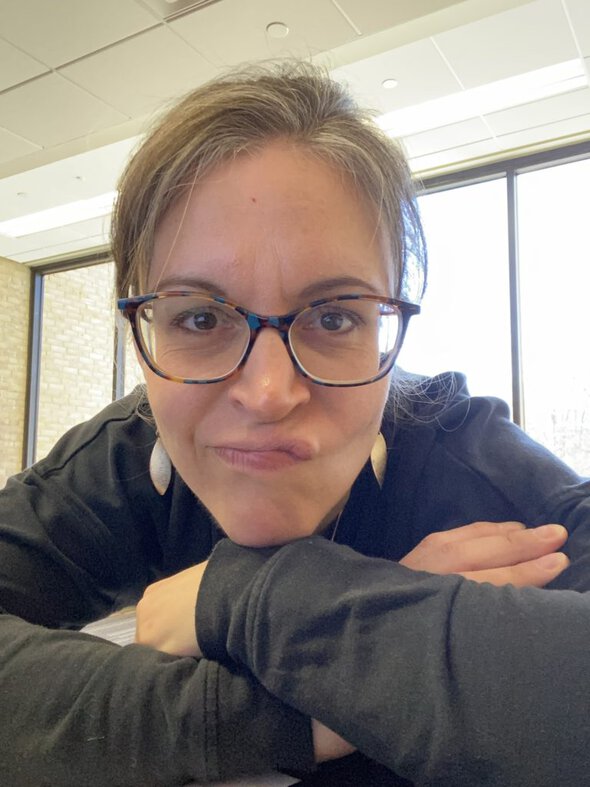 Kristen making an upset face.