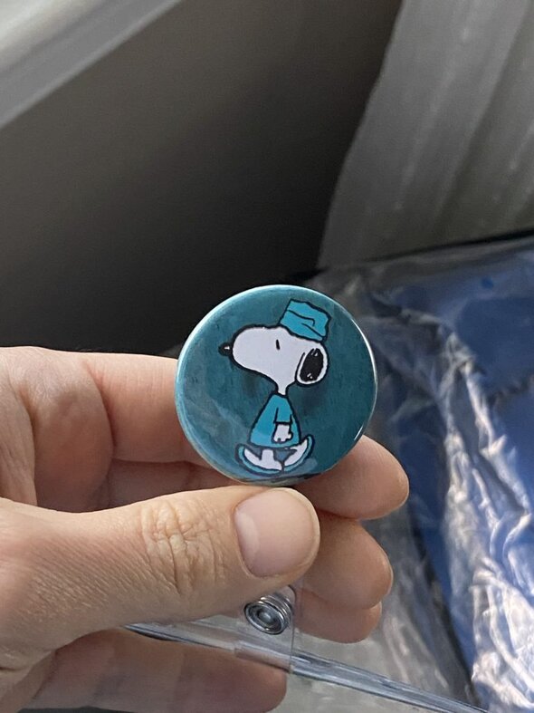 Snoopy badge holder.