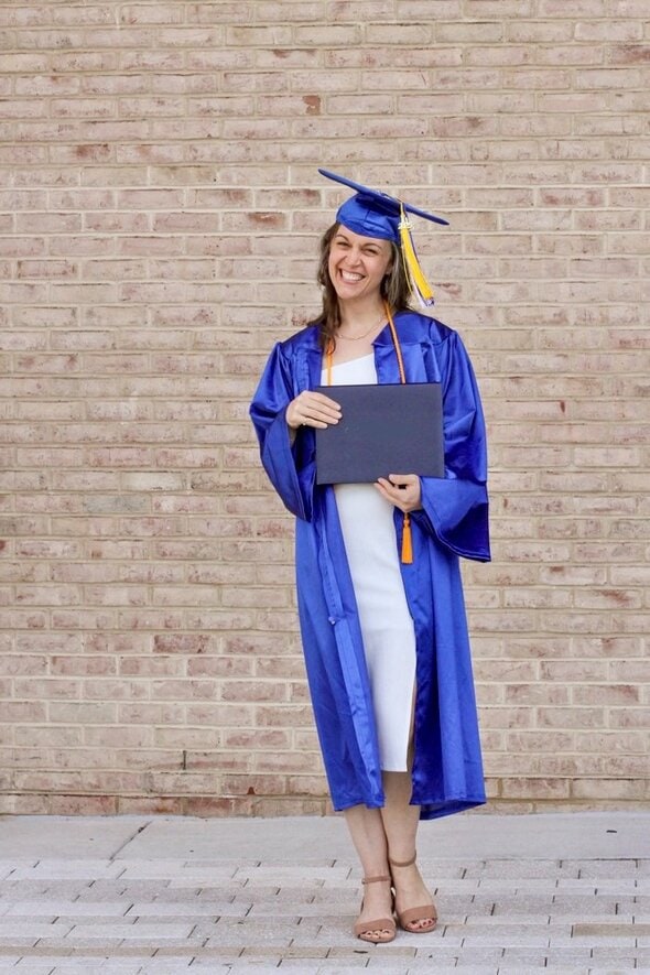 Kristen in cap and gown.