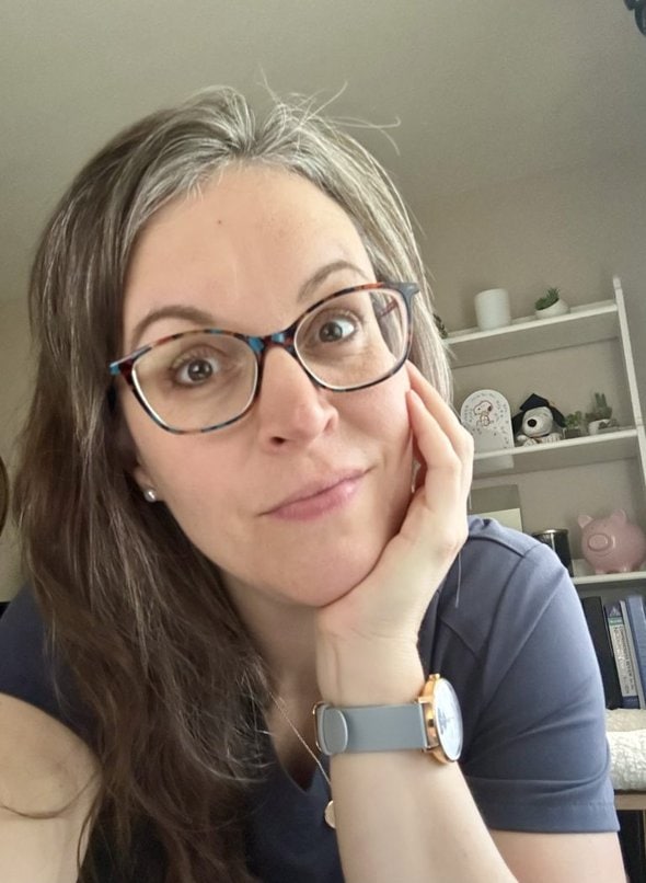 kristen with an unhappy face.