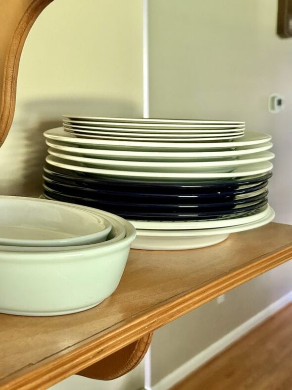 dishes on a shelf.