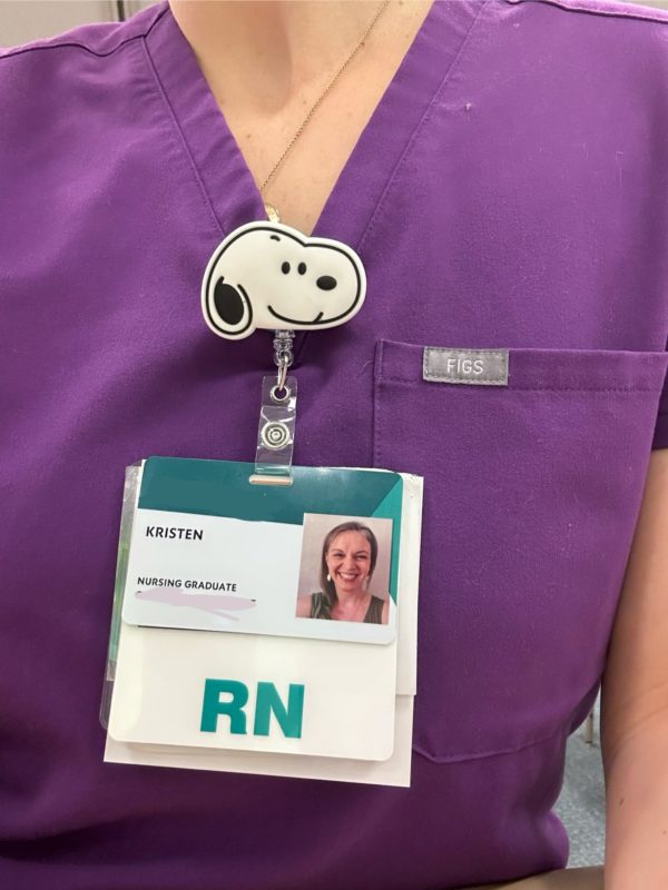 Kristen's RN badge.