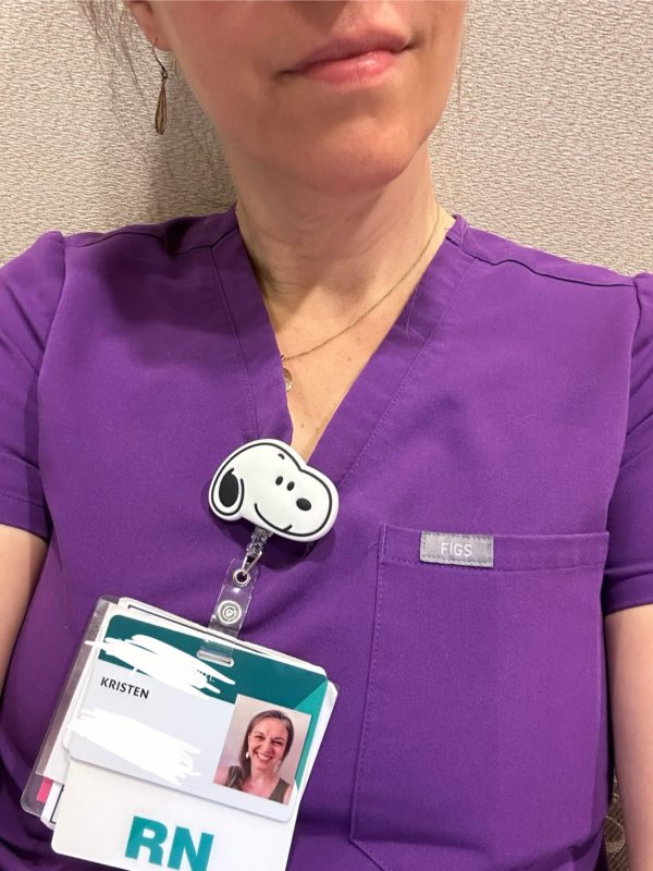 Kristen in purple scrubs.