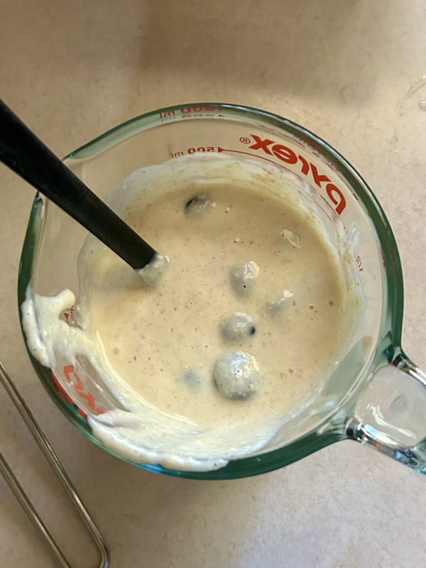 batter in measuring cup.
