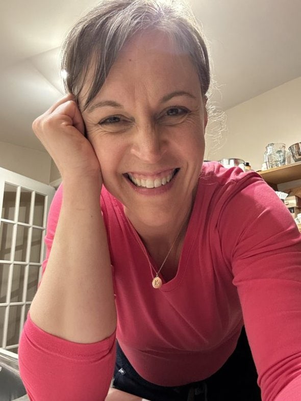 Kristen in pink shirt.