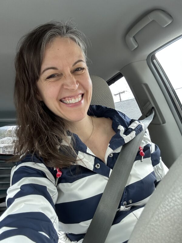 Kristen in a stripey coat.