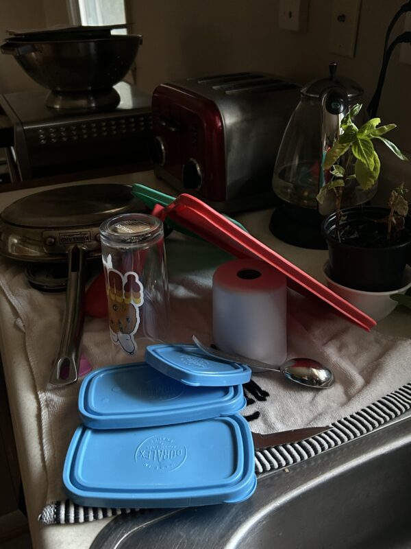 wet dishes on a countertop.