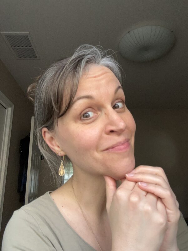 Kristen with gray hair.