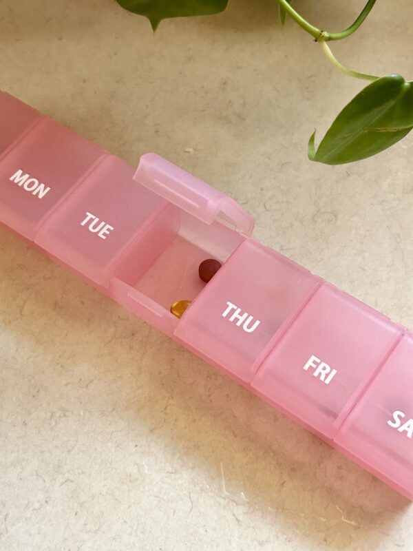 pink pill container.