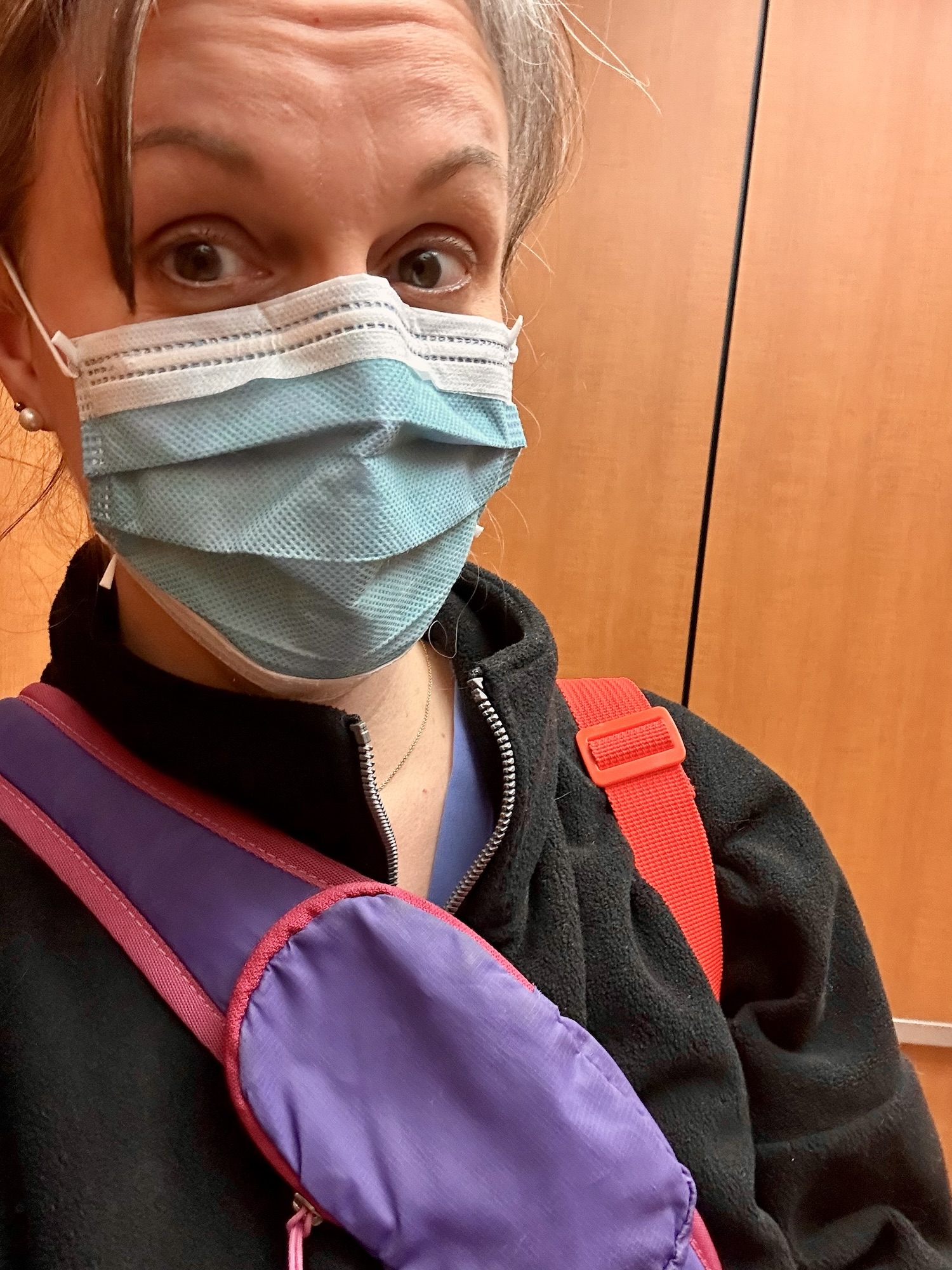 Kristen wearing a mask.