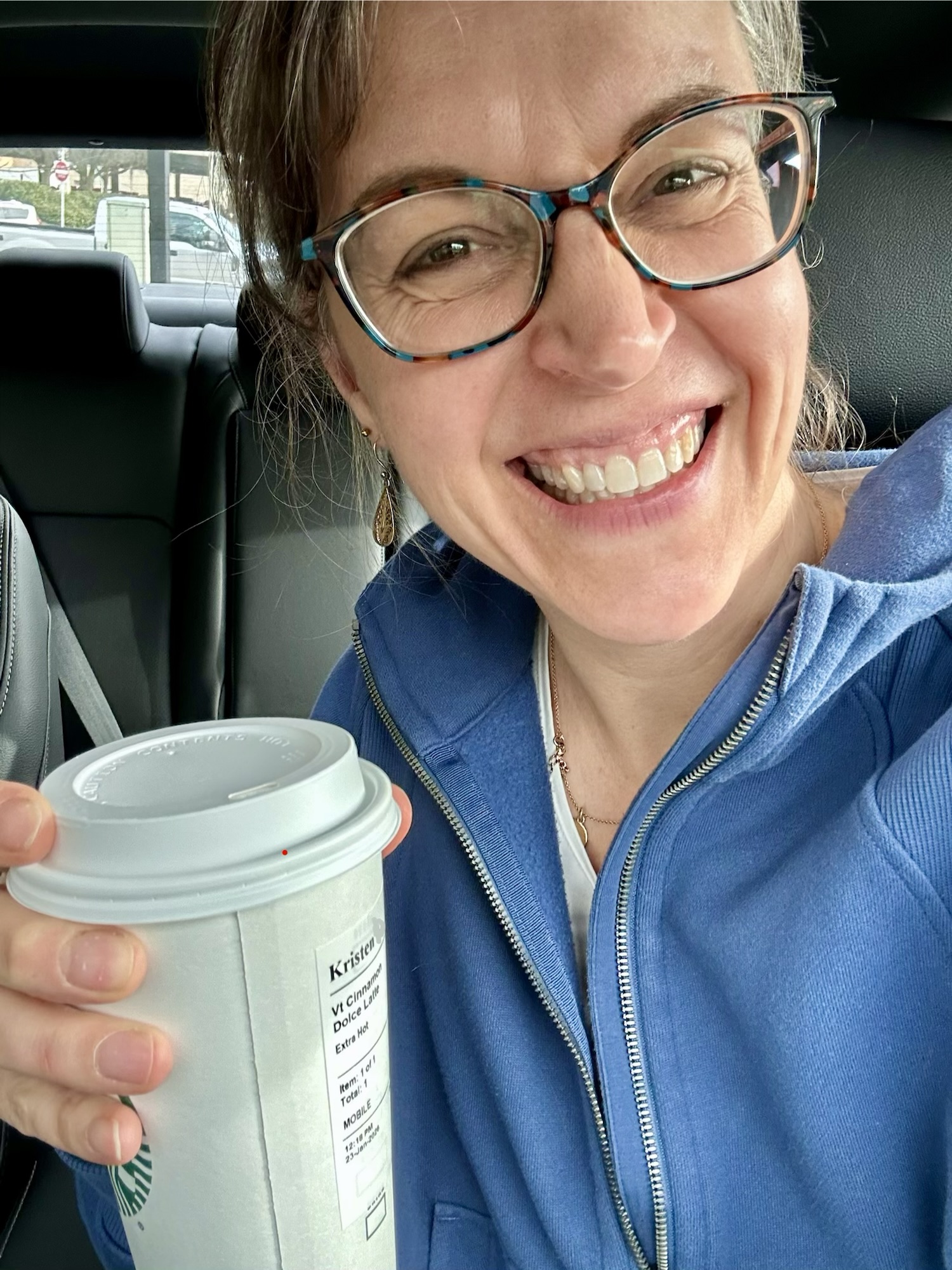 Kristen with a coffee.