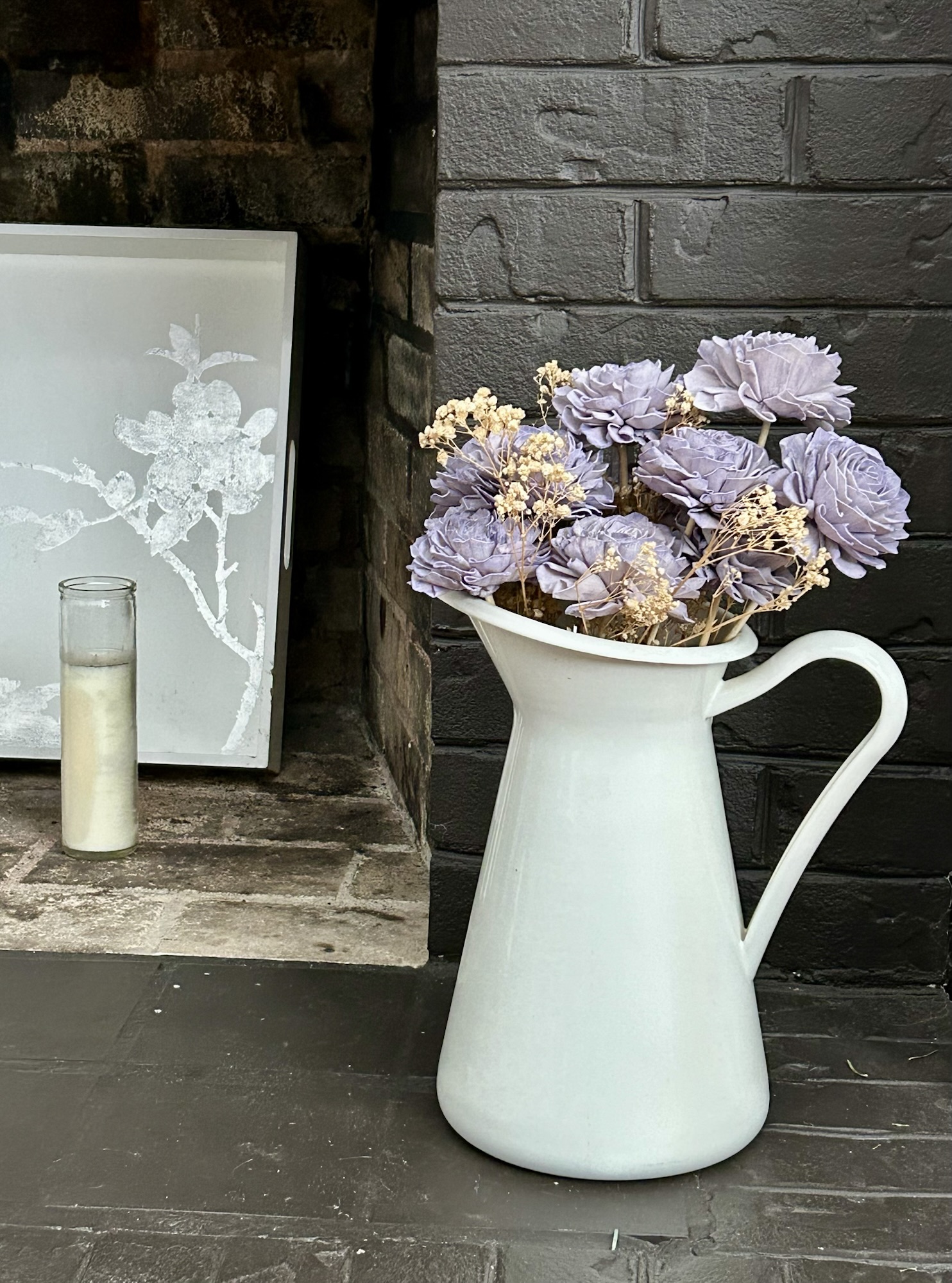 flowers in a pitcher.