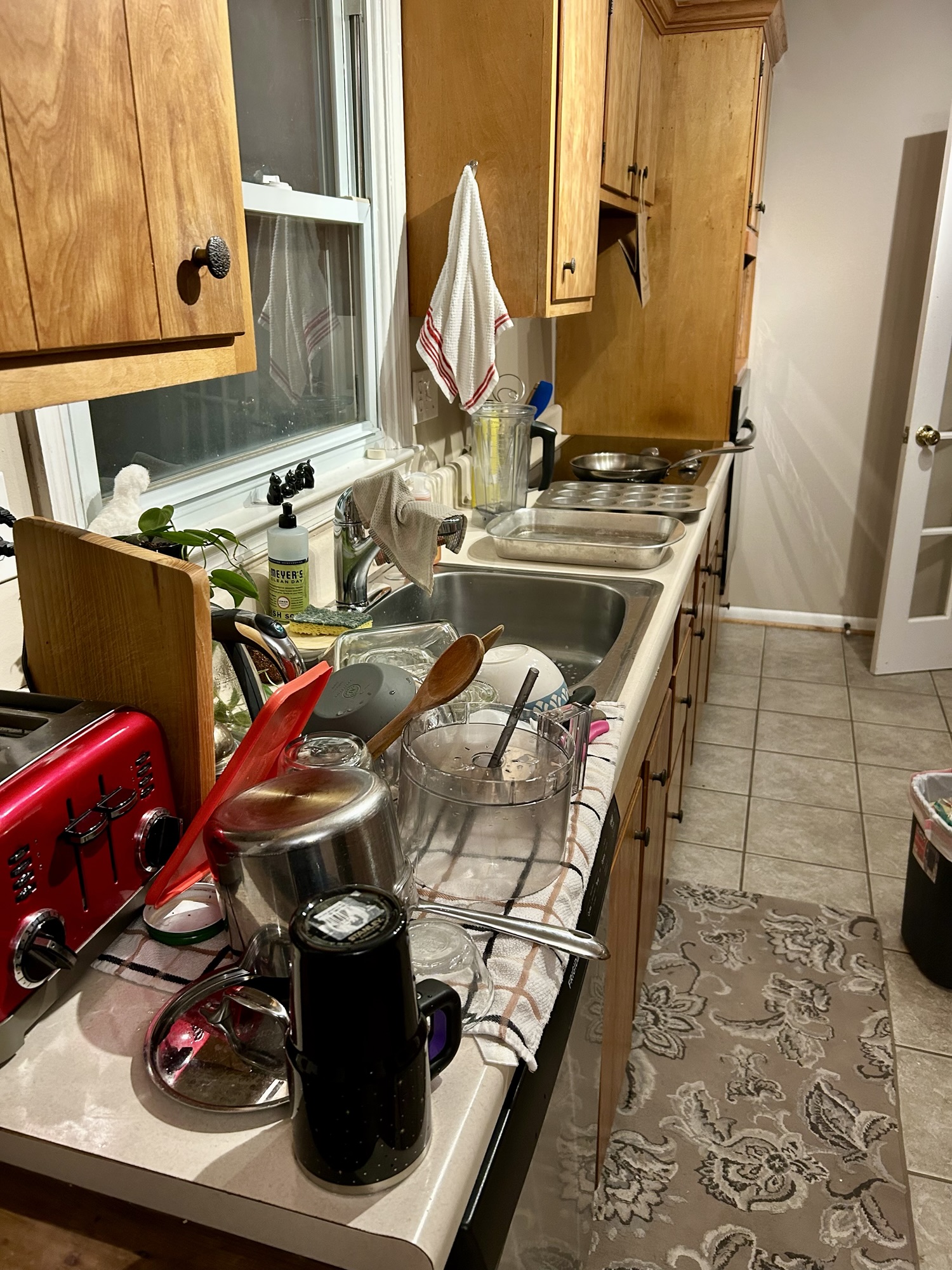 dishes drying on counter.