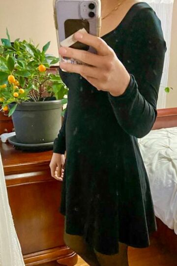 Kristen in a black dress.