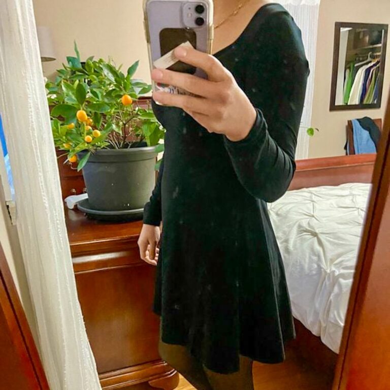 Kristen in a black dress.