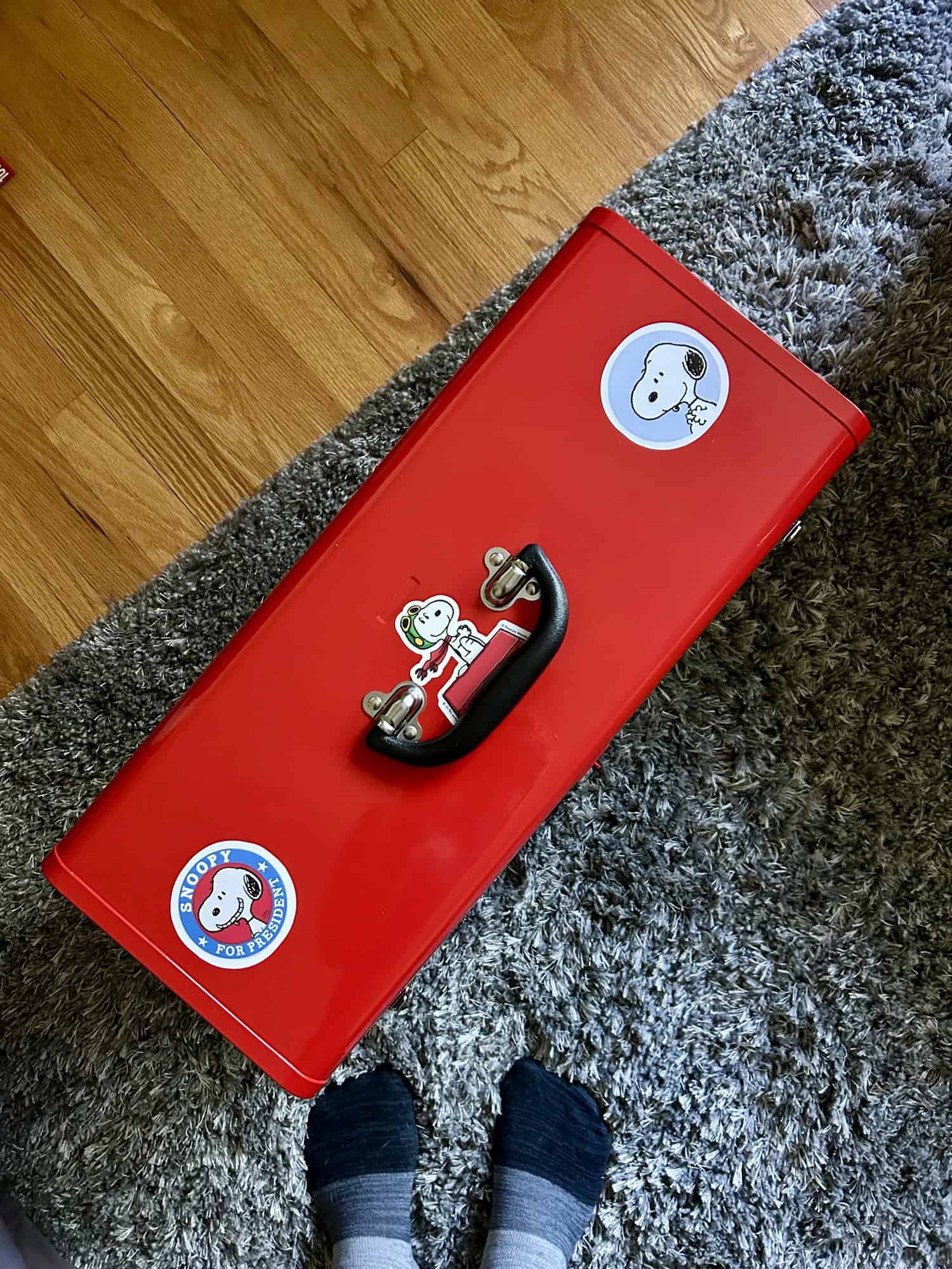 Snoopy stickers on toolbox.